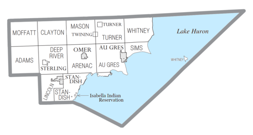 U.S. Census data map showing local municipal boundaries within Arenac County.  Shaded areas represent incorporated cities.