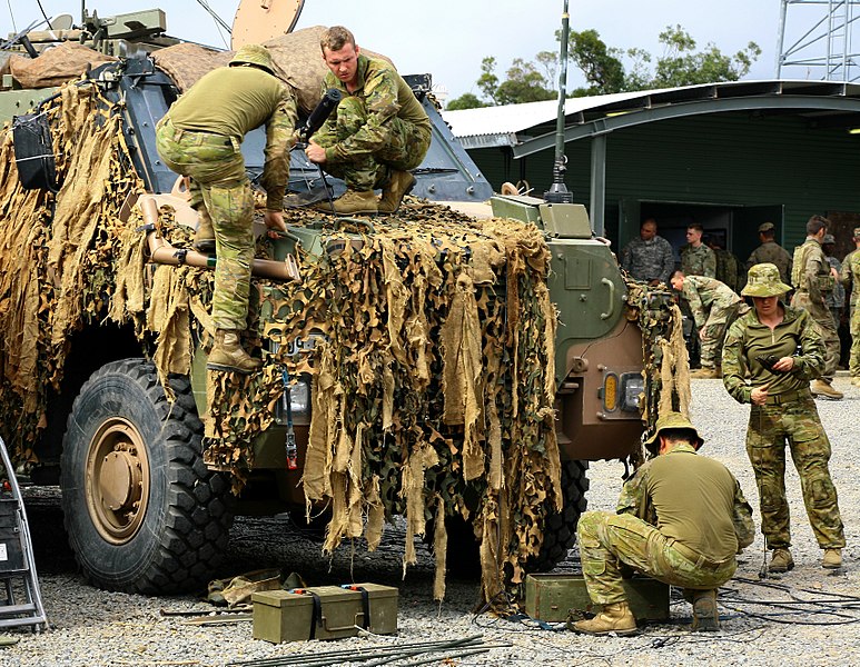 File:Australian soldiers attach netting to a Bushmaster PMV during Talisman Saber 2017.jpg