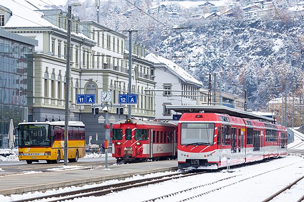 Brig station square with MGB trains