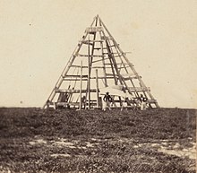 Beacon erected on Mellish Reef in the Coral Sea in 1859 Beacon erected on Mellish Cay by H.M.S Herald 1859.jpg
