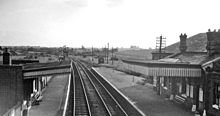 Bearley station; the Alcester line curves to the right beyond the signal gantry Bearley railway station 1773840 09304296.jpg