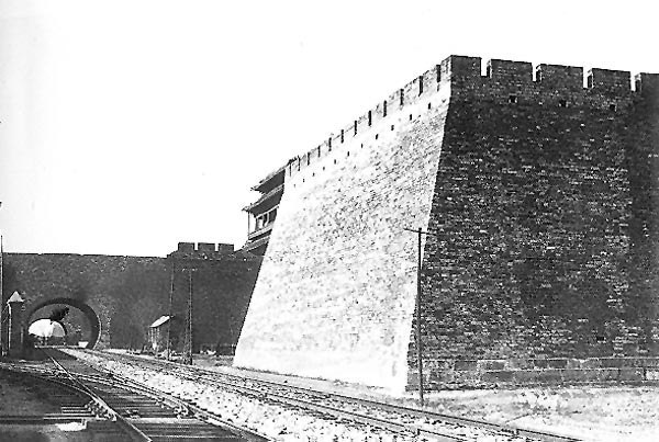 Beijing Inner city Chongwenmen barbican as seen in 1902. The sluice gate of the barbican has already been dismantled by British forces. A railway arch