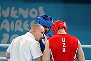 Deutsch: Boxen bei den Olympischen Jugendspielen 2018 Tag 12, 18. Oktober 2018 - Kampf um die Bronzemedaille im Fliegengewicht Mädchen – Timur Merjanow (Usbekistan, rot) schlägt Youssef Ali Karar Ali (Ägypten, blau) 5-0; Ringrichter ist Antonín Gaspar (Tschechien). English: Boxing at the 2018 Summer Youth Olympics on 18 October 2018 – Boy's heavyweight Bronze Medal Bout - Timur Merjanov (Uzbekistan, red) beats Youssef Ali Karar Ali (Egypt, blue) 5-0; Referee is Antonín Gaspar (Czech Republic). Español: Boxeo en los Juegos Olímpicos Juveniles de Verano de 2018 en 18 de octubre de 2018 - Medalla de bronce de peso pesado del muchacho: Timur Merjanov (Uzbekistán, roja) le gana a Youssef Ali Karar Ali (Egipto, azul) 5-0; El árbitro es Antonín Gaspar (Republica checa).