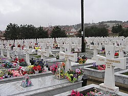 A Serbian cemetery of the civil victims of the war. Bratunac-Serbian-Cemetery-Bosnia-War.jpg