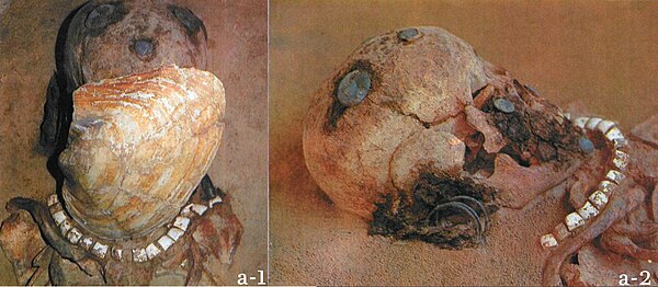 Burial at Zhoujiadi cemetery (with and without mussel mask), an ancestor of the Donghu clan, Upper Xiajiadian culture (1000-600 BCE).