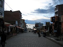 Shopping street with lake Titicaca in the background