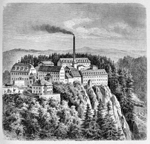 The Rabenau castle hill (1883) with the furniture factory founded here in 1866