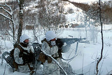 Marines with 2nd Battalion, 25th Regiment open fire upon a mock enemy force during a training raid while at Exercise Cold Response 2010 in Norway. Exercise Cold Response 2010.jpg