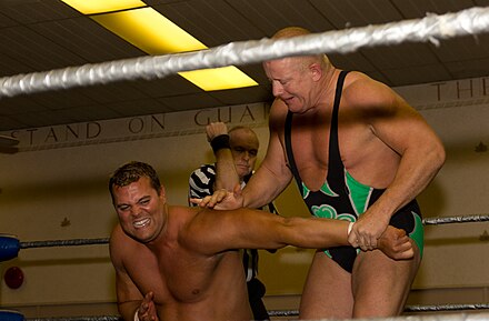 Finlay wrestling Harry Smith in November 2011