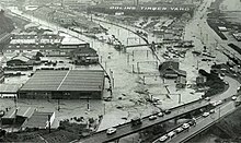 Flooding in Petone around the industrial area near Cornish Street, with the Petone offramp in the foreground. Flooding in Petone, December 1976.jpg