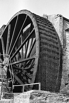 The waterwheel in use, in 1962 Foster Beck Flax Mill - geograph.org.uk - 4301308.jpg
