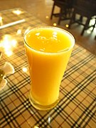 A glass of mango juice