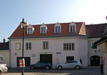 Hauerhaus, gate building and side wings with a cellar