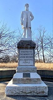 Quindaro, now Western University Memorial Plaza, whose centerpiece is a life-size white marble statue of abolitionist John Brown, as the only remaining artifact John Brown statue at Quindaro Township.jpg