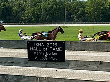 Hall of Fame plaque for Kenny Barlow and V. Lady Plaid