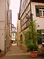 Very short alleyway Ledergäßchen (leather alleyway) behing the Old Mind in Speyer, Germany