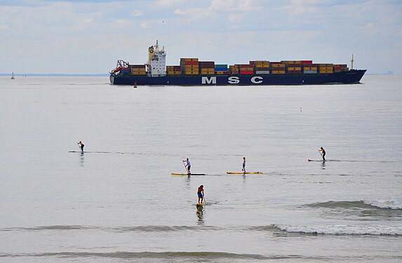 On sea, ship and paddlers