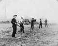 Men trap shooting in field, probably at Bloedel-Donovan Lumber Mills employees picnic, ca 1922-1923 (INDOCC 1108).jpg