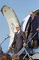 Israeli Prime Minister Menachem Begin (front) exits from the aircraft upon his arrival in the United States. He is accompanied by Israeli Foreign Minister Moshe Dayan (rear).