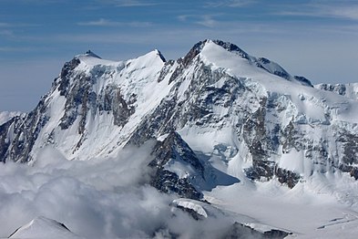 The east and north side with the 600-metre-high (2,000 ft) north face of the Nordend (as seen from the Strahlhorn)