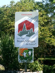 Road sign in Montresor Montresor beau village.jpg