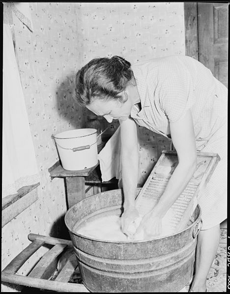 File:Mrs. Sergent washing. She is a tireless and meticulous housekeeper and her children are always in clean, starched and... - NARA - 541373.jpg