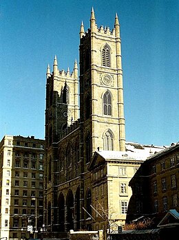 Notre-Dame Basilica, with two steeples, against blue sky