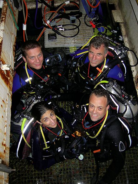 The NEEMO 9 Crew: Left to right (rear): Dr. Tim Broderick, Williams; front: Nicole Stott, Ron Garan.