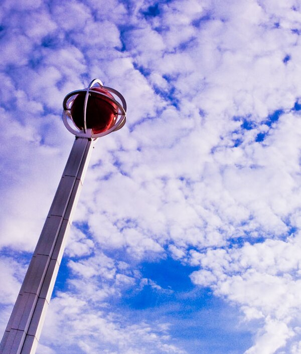 Basketball in the sky above the Naismith Memorial Basketball Hall of Fame