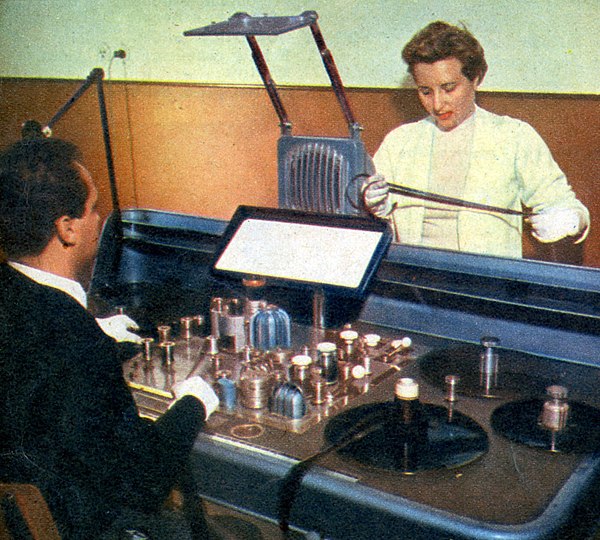 Nino Baragli with his spouse at work in 1957