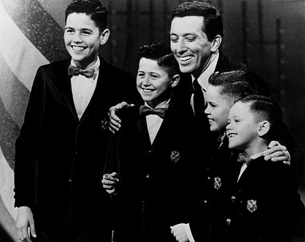 The boys with Andy Williams in 1964. From left: Alan, Wayne, Williams, Merrill and Jay.