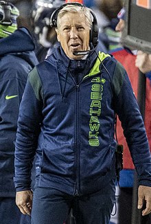 Pete Carroll - Color photograph of silver-haired Pete Carroll