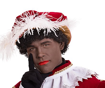 A person in costume as Zwarte Piet