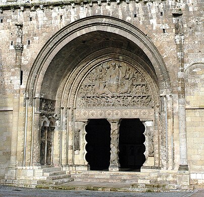 The portal of Saint-Pierre, Moissac, has unusual features including the frieze of roundels on the lintel, the scalloped jambs and figures of prophets on the central jamb