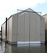 Another style of boathouse in Reed Point Marina, Canada