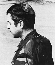 Jewish chaplain Rabbi Arnold Resnicoff wears a kippah/yarmulke made from a piece of a Catholic chaplain's camouflage uniform after his own head covering had become bloodied when it was used to wipe the face of a wounded marine during the 1983 Beirut barracks bombing. Resnicoff BeirutKippa.jpg