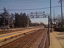 The platforms at River Grove station, which serves trains on both the North Central Service and the Milwaukee District West Line River Grove Metra.jpg