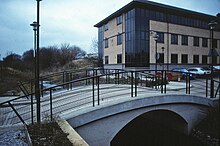 Around the time it was acquired by SCO, Visionware moved its offices to Waterside House on the Kirkstall Road in Leeds, here seen in 1997 SCO offices in Leeds England in Waterside House with Kirkstall Goit.jpg