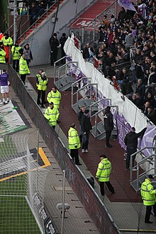 https://upload.wikimedia.org/wikipedia/commons/thumb/9/9a/Security_guards_FC_Sankt_Pauli_001.jpg/220px-Security_guards_FC_Sankt_Pauli_001.jpg