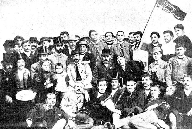 The Bucharest socialist circle in 1892. Mille, holding his two daughters in his lap, is third seated from the left in the second row; next in line, se