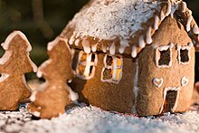 A gingerbread house with decorations Sweet Gingerbread House (25238623728).jpg