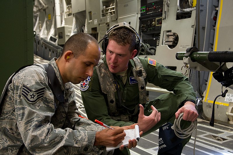 File:U.S. Air Force Staff Sgt. Joseph Araiza, left, a photojournalist with the 4th Combat Camera Squadron, interviews Staff Sgt. Michael Stevens, an aeromedical service journeyman with the 86th Aeromedical Evacuation 140313-F-RW714-217.jpg