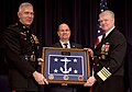 Being presented to SECNAV Donald Winter