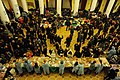 Volunteers sharing food and drinks with Euromaidan participants in the hall of the Trade-Union House. December 3, 2013.