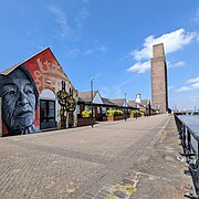 Waterfront at Woodside, Birkenhead showing Glenda Jackson mural and ventilation shaft.jpg