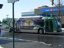 Woodstock Transit 10-12 is seen leaving downtown on route 6 Southwest Woodstock Transit 10-12.jpg