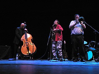 Zorn with Gavin Bryars and George E. Lewis at the Barbican Tribute to Derek Bailey, 2006. Zorn-Barbican.jpg