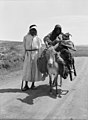 'Flight into Egypt' Bedouin types - woman & infant on donkey, man(?) standing LOC matpc.19007.jpg