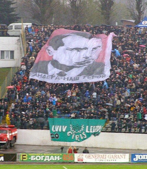 Lviv football fans at a 2010 game against Donetsk. The banner reads "Bandera – our hero."