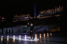 President George W. Bush enters Rice-Eccles Olympic Stadium during the Opening Ceremony 2002 Winter Olympics Opening George W Bush.jpg